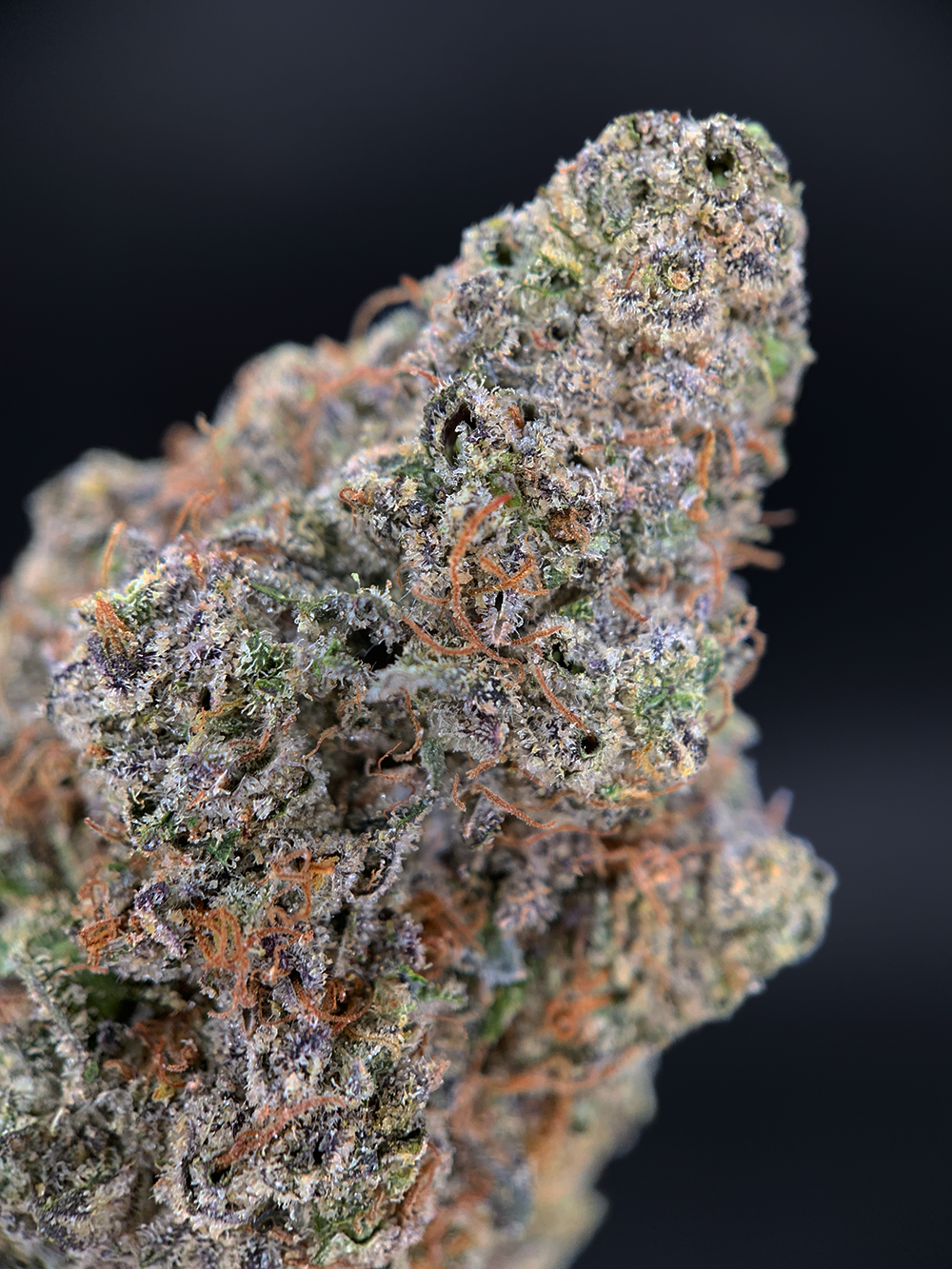 Jelly Roll indica hybrid cannabis strain with 24–28% THC, sweet berry and grape aroma, available for weed delivery in Washington DC and Northern Virginia via District Connect.