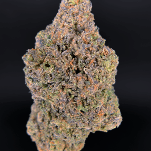Pink Monet hybrid strain (26–30% THC) with cherry and citrus aroma, purple buds, and uplifting calm effects, available for weed delivery in Washington DC and Northern Virginia via District Connect.